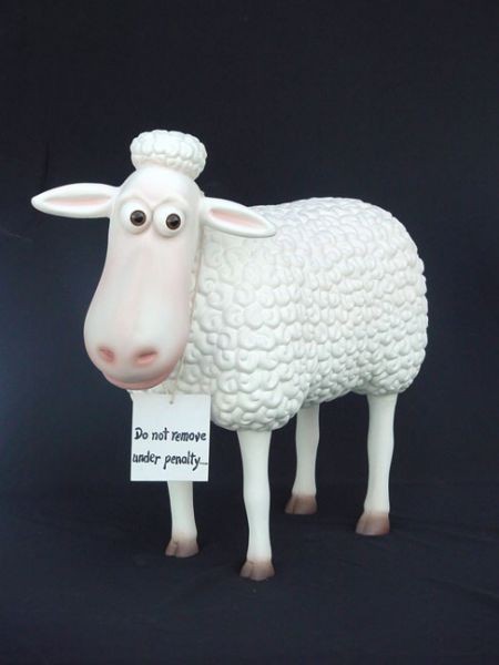 Lustiges Comic Schaf mit Schild