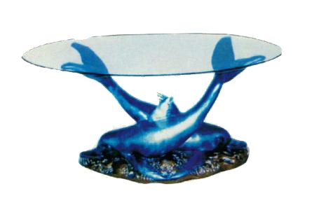 Glastisch mit Delfinen