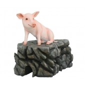 Schwein rosa sitzend