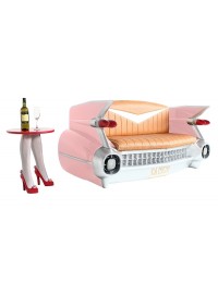 Sofa Cadillac Rosa mit braunem Polster und Zeitschriften und Get