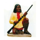 amerikanische Ureinwohnerin mit Schusswaffe sitzend