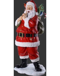 Weihnachtsmann mit Spielzeugsack lebensgroß