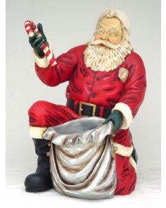 Weihnachtsmann kniend lebensgroß