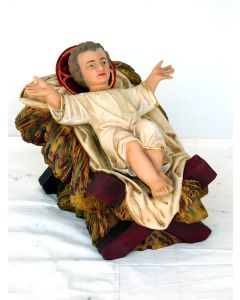 mittelgroßes liegendes Jesuskind in Krippe verkleinert