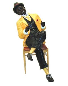Negro lesend lebensgroß