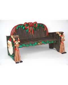 Weihnachtsbank mit Weihnachtsmanngesichtern und Rentieren lebensgroß