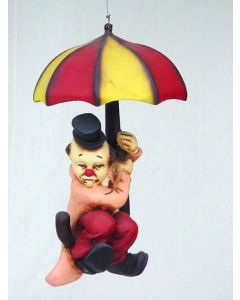Clown fliegend mit Sonnenschirm verkleinert