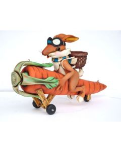 Osterhase modern fliegend auf Karotte vergrößert