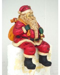 Weihnachtsmann sitzend klein verkleinert