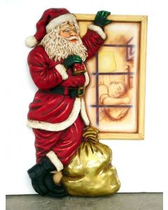 Weihnachtsmann am Fenster stehend klein verkleinert
