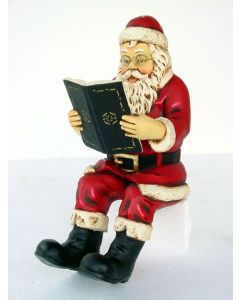 Weihnachtsmann Buch lesend klein verkleinert