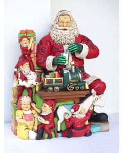 Weihnachtsmann beim Basteln lebensgroß