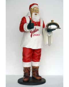 Weihnachtsmann als Spezialitätenkoch lebensgroß
