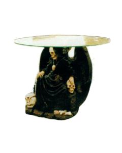 Glastisch mit sitzendem Skelett verkleinert