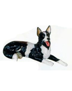 Border Collie liegend lebensgroß