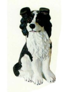 Border Collie sitzend lebensgroß
