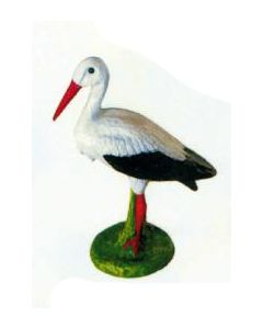 kleiner Storch auf Wiese lebensgroß