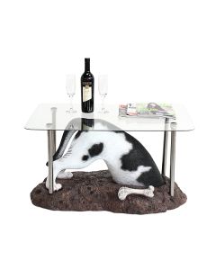 Schwarzweißer Hund buddelnd Tisch mit Glasplatte lebensgroß