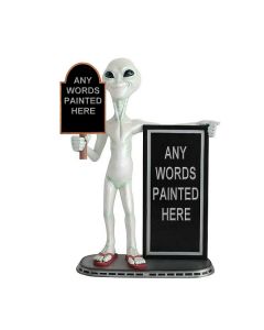 Alien mit kleiner und großer Angebotstafel lebensgroß