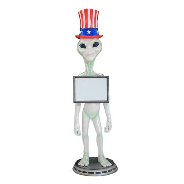 Alien mit amerikanischem Hut und Angebotsschild lebensgroß